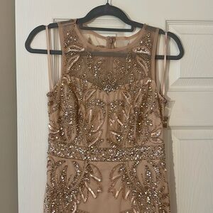 Papell studio beaded column gown in rose gold.